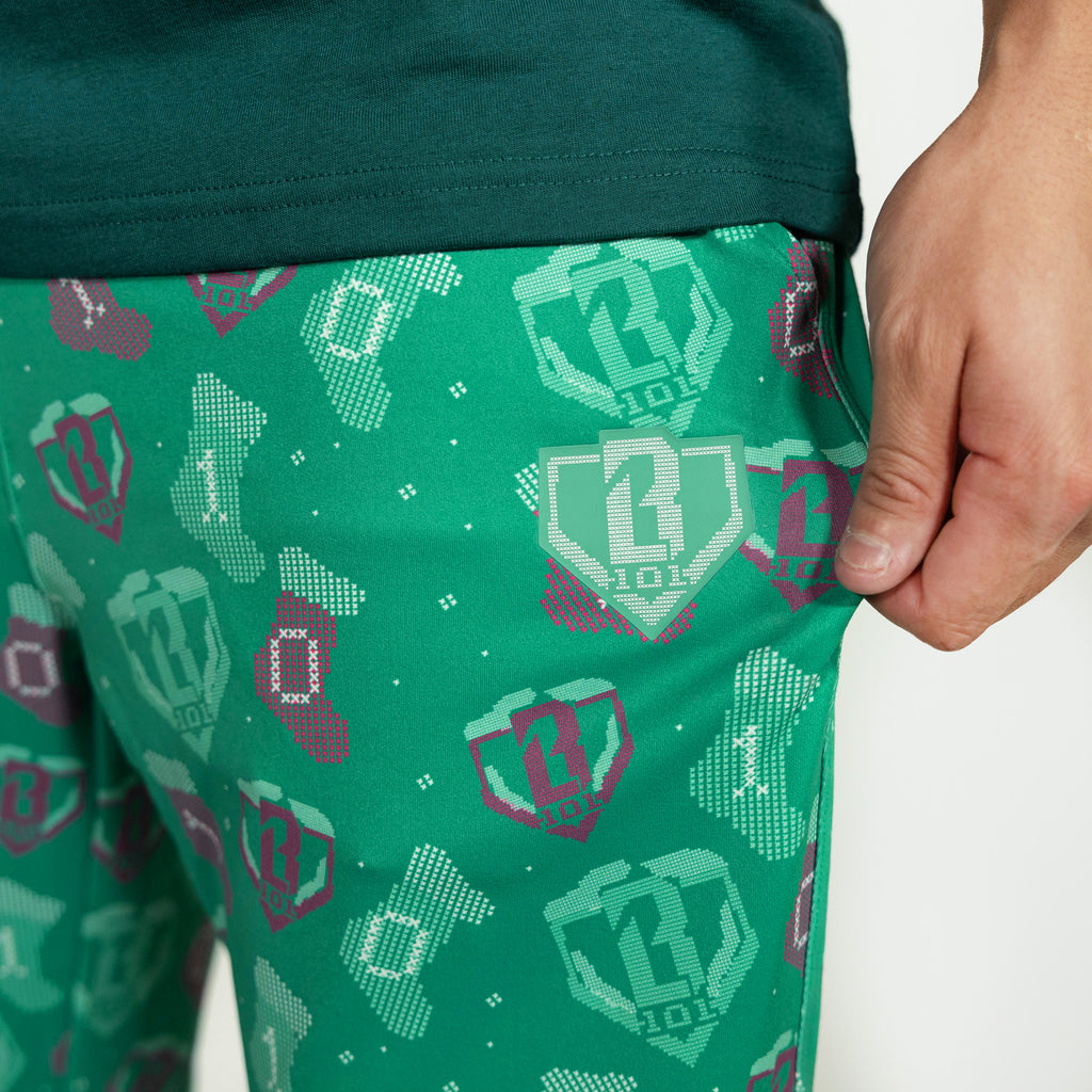 Adult model wearing green Stitched For The SZN pajama pants