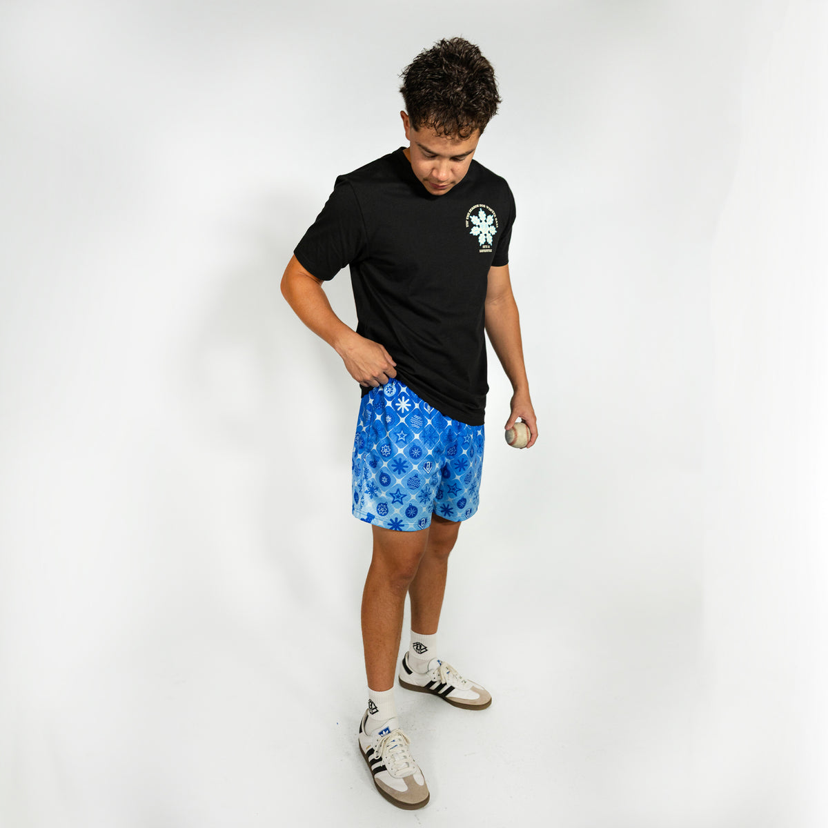 Adult model wearing blue shorts with "Frozen Diamond" design