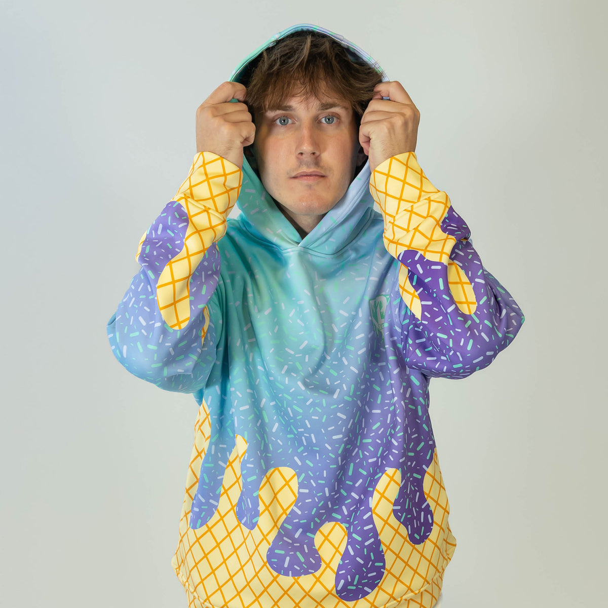 Adult model wearing multi-color Ice Cream Galaxy Grape hoodie with "Ice Cream" design