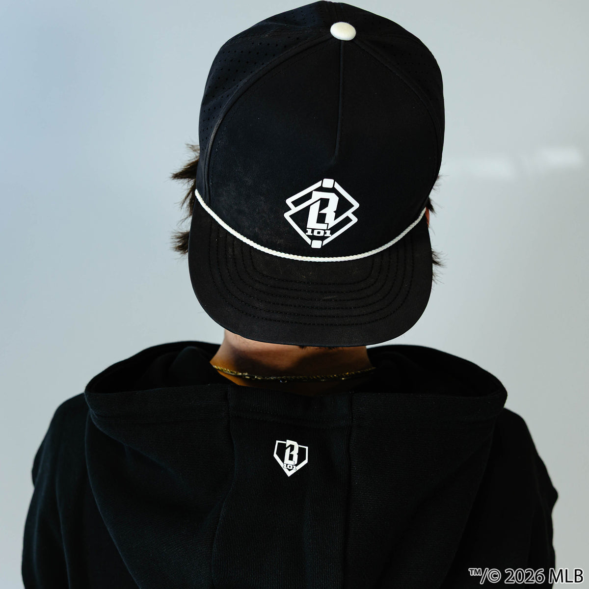 Adult model wearing black BL101 x MLB Established League hoodie