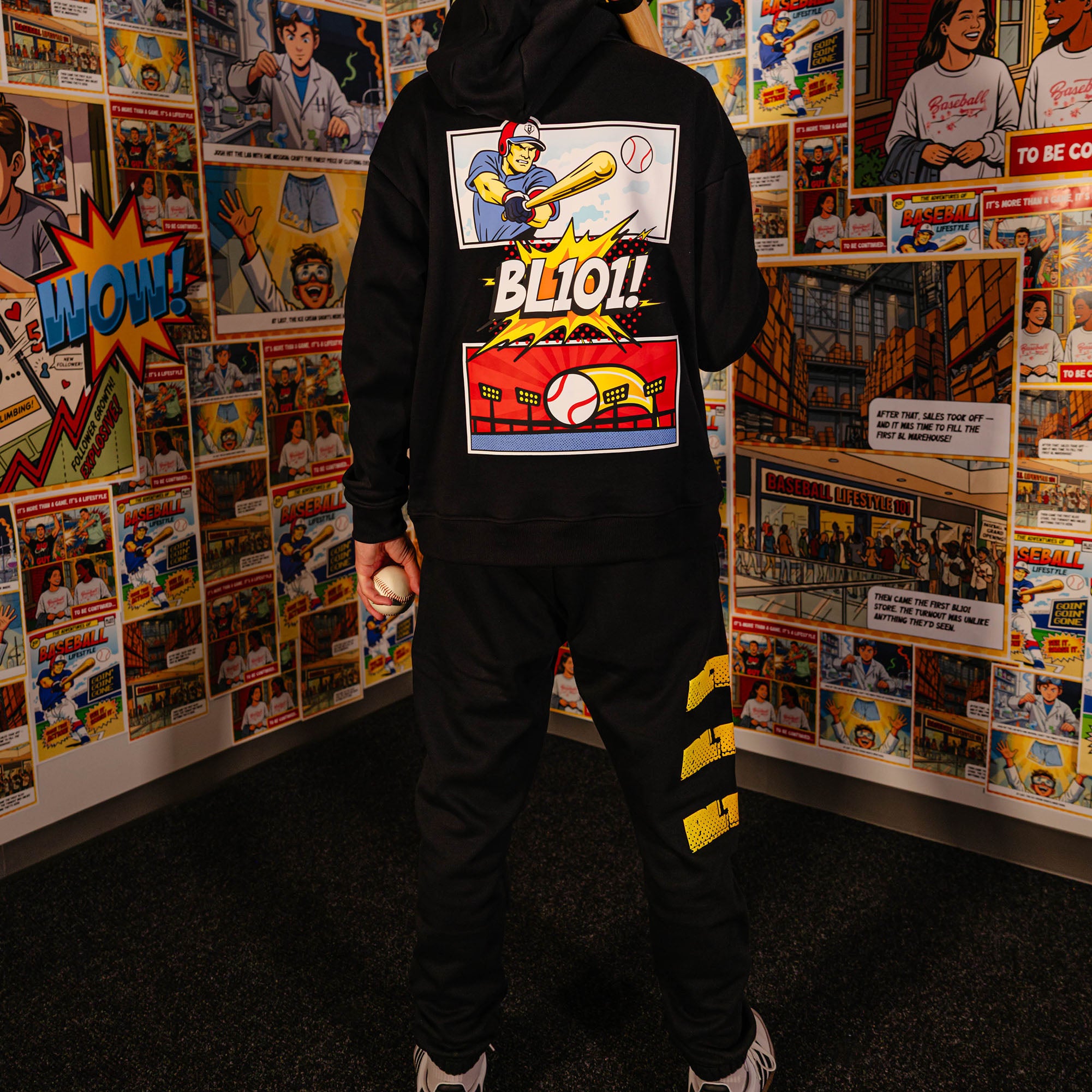 Adult model wearing black sweatpants with "Power Hitter" design