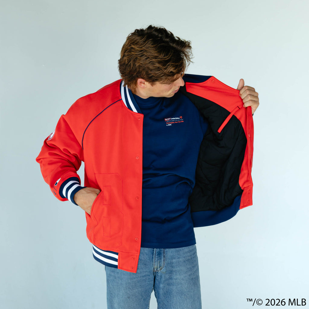 Adult model wearing red Boston Red Sox Stadium bomber jacket