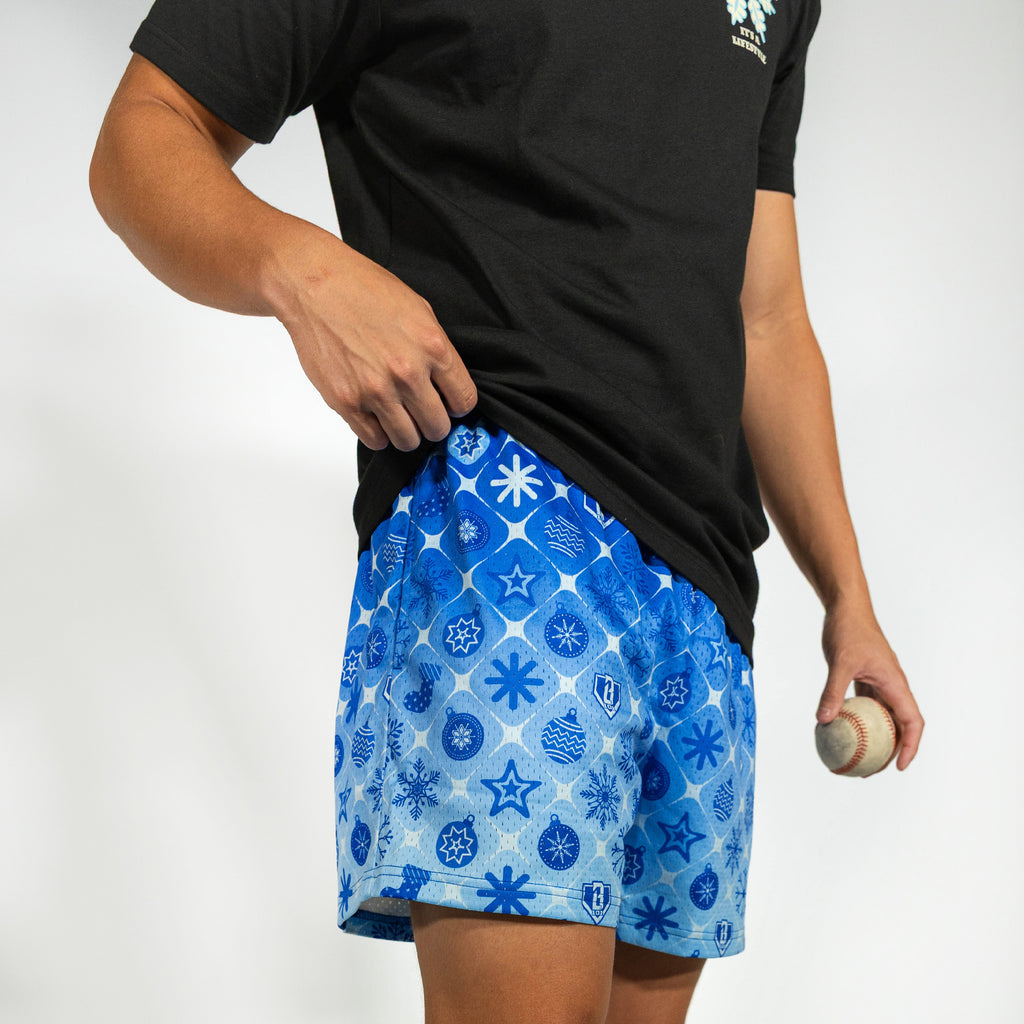 Adult model wearing blue shorts with "Frozen Diamond" design