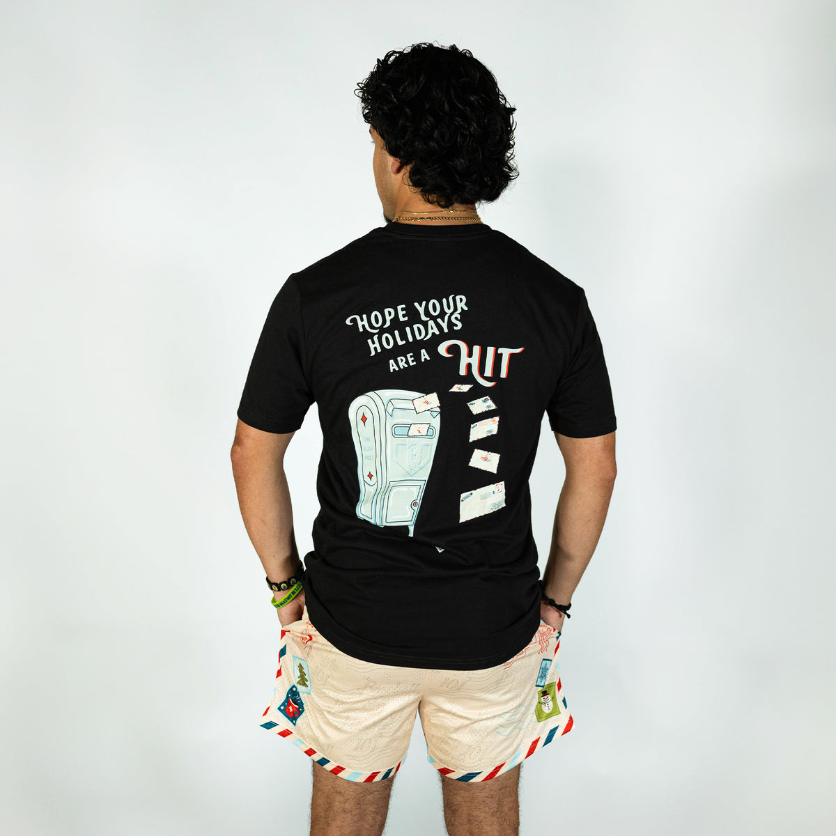 Adult model wearing white shorts with "Letter To Santa" design