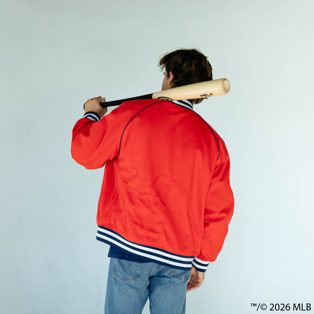 Adult model wearing red Boston Red Sox Stadium bomber jacket
