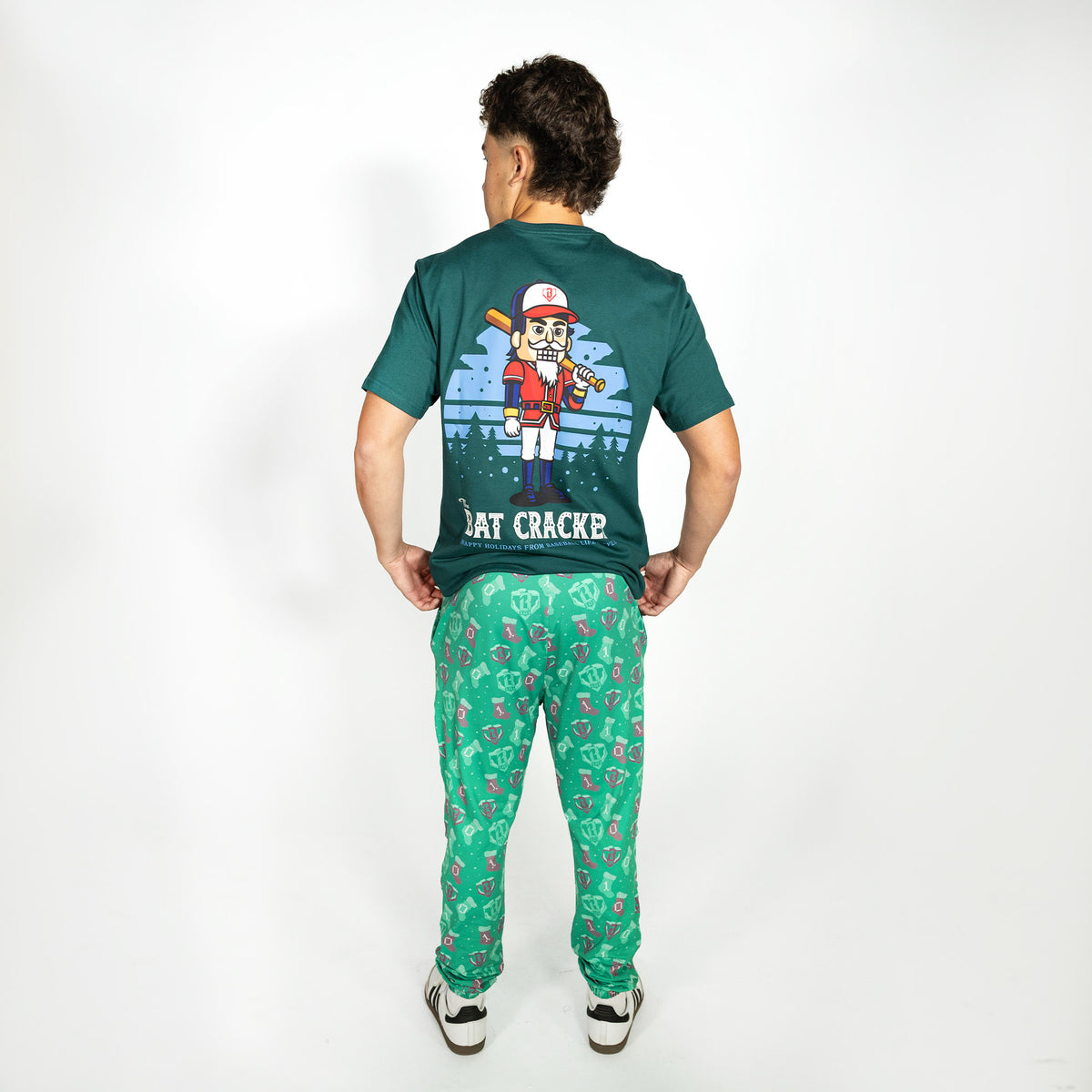 Adult model wearing green Stitched For The SZN pajama pants