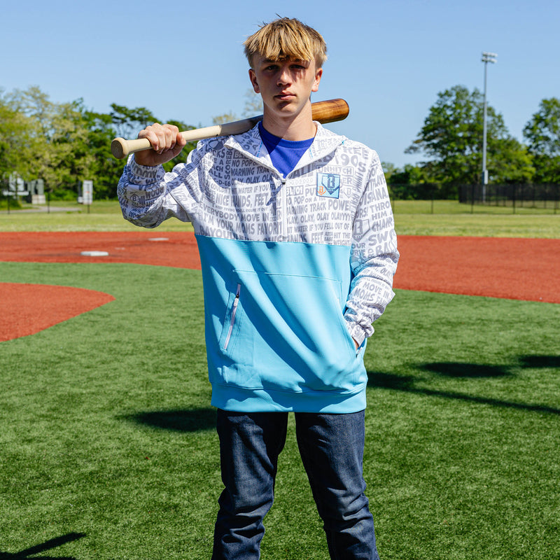 Adult model wearing multi-color hoodie with "UVChangeup Trash Talk" design