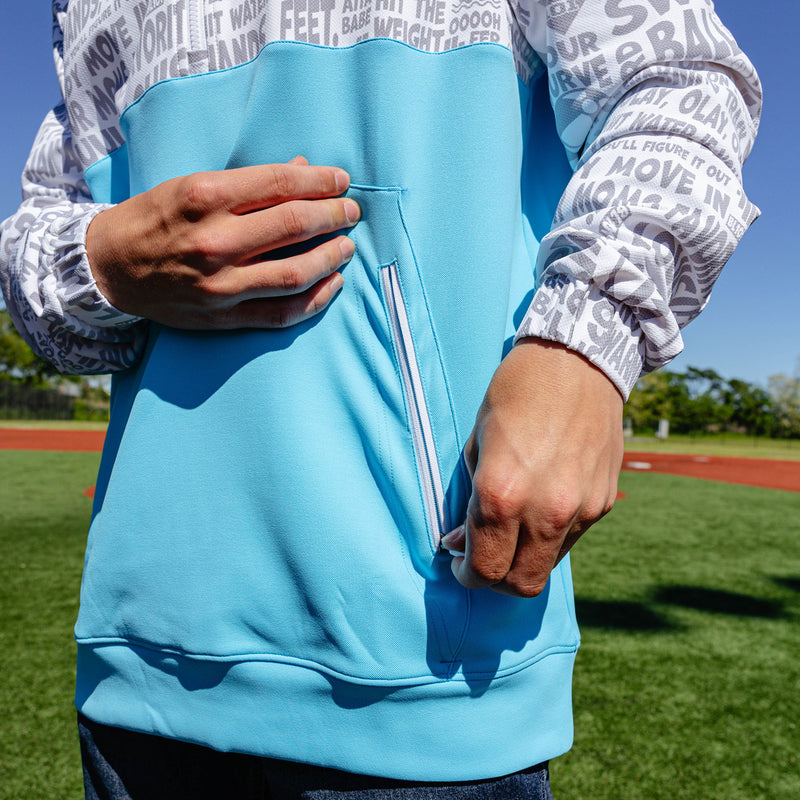 Adult model wearing multi-color hoodie with "UVChangeup Trash Talk" design