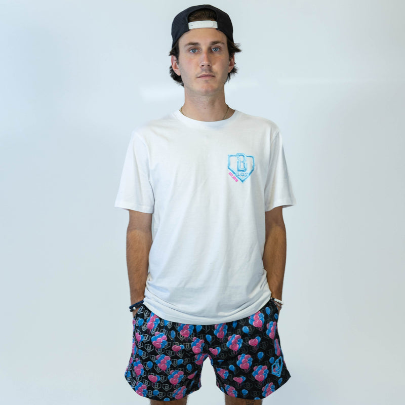 Adult model wearing black shorts with "10 Year Anniversary" design