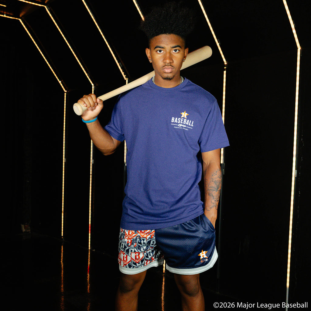 Adult model wearing navy graphic tee with "Houston Astros Ice Cream" design