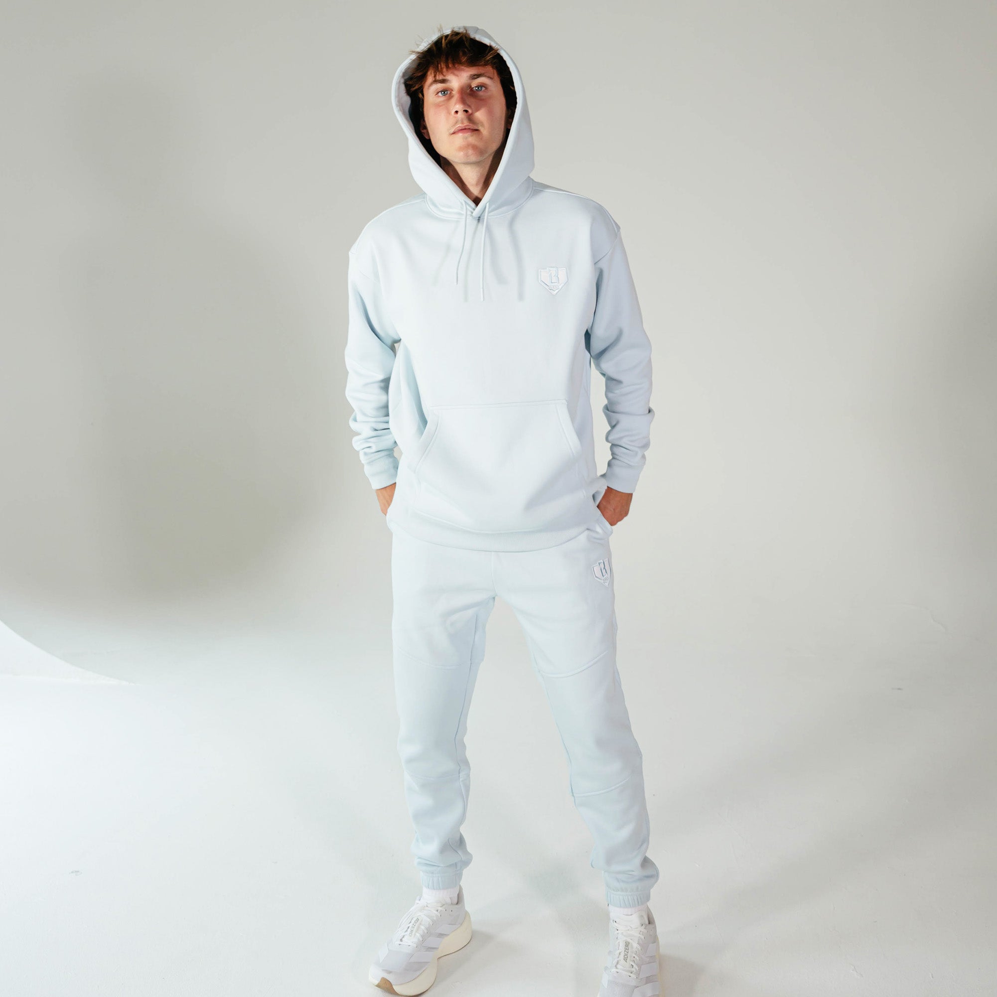 Adult model wearing Blue Baseline joggers
