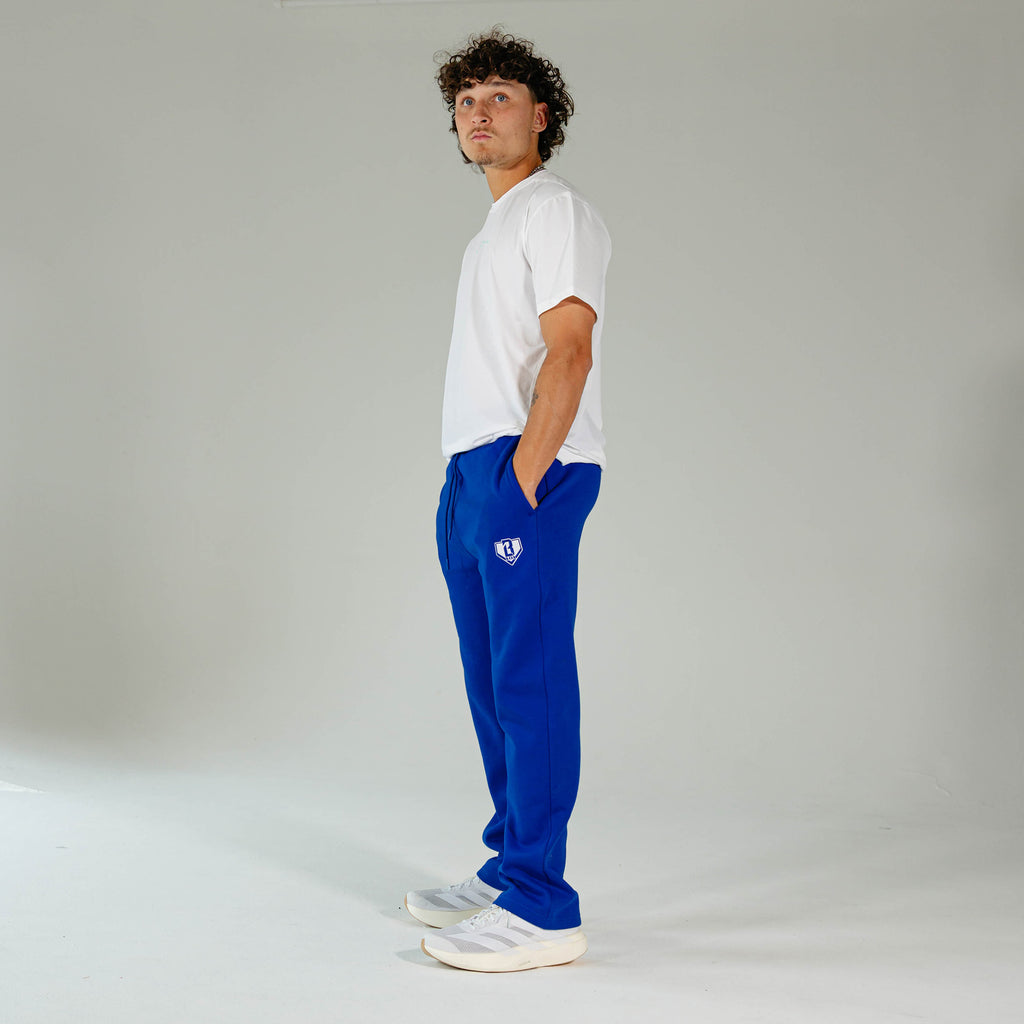 Adult model wearing Blue Baseline Straight Leg sweatpants