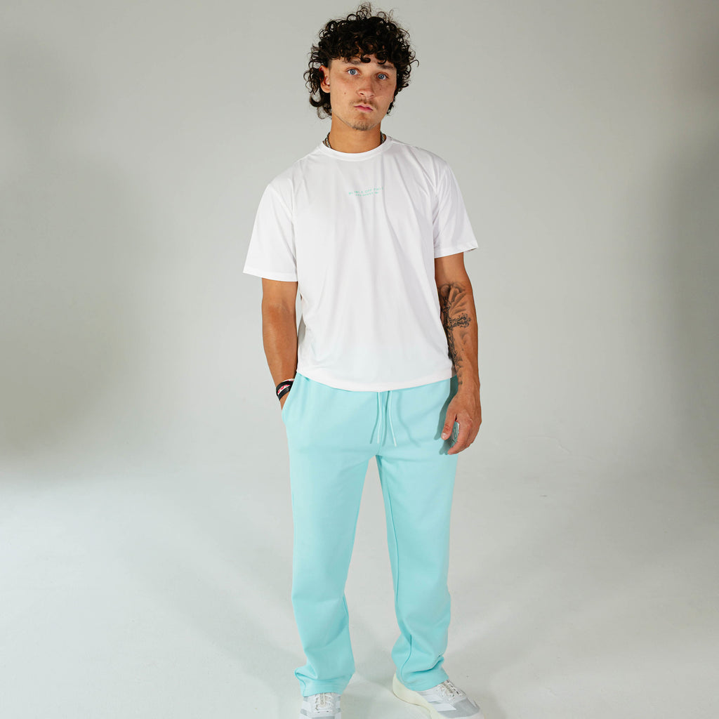 Adult model wearing Blue Baseline Straight Leg sweatpants
