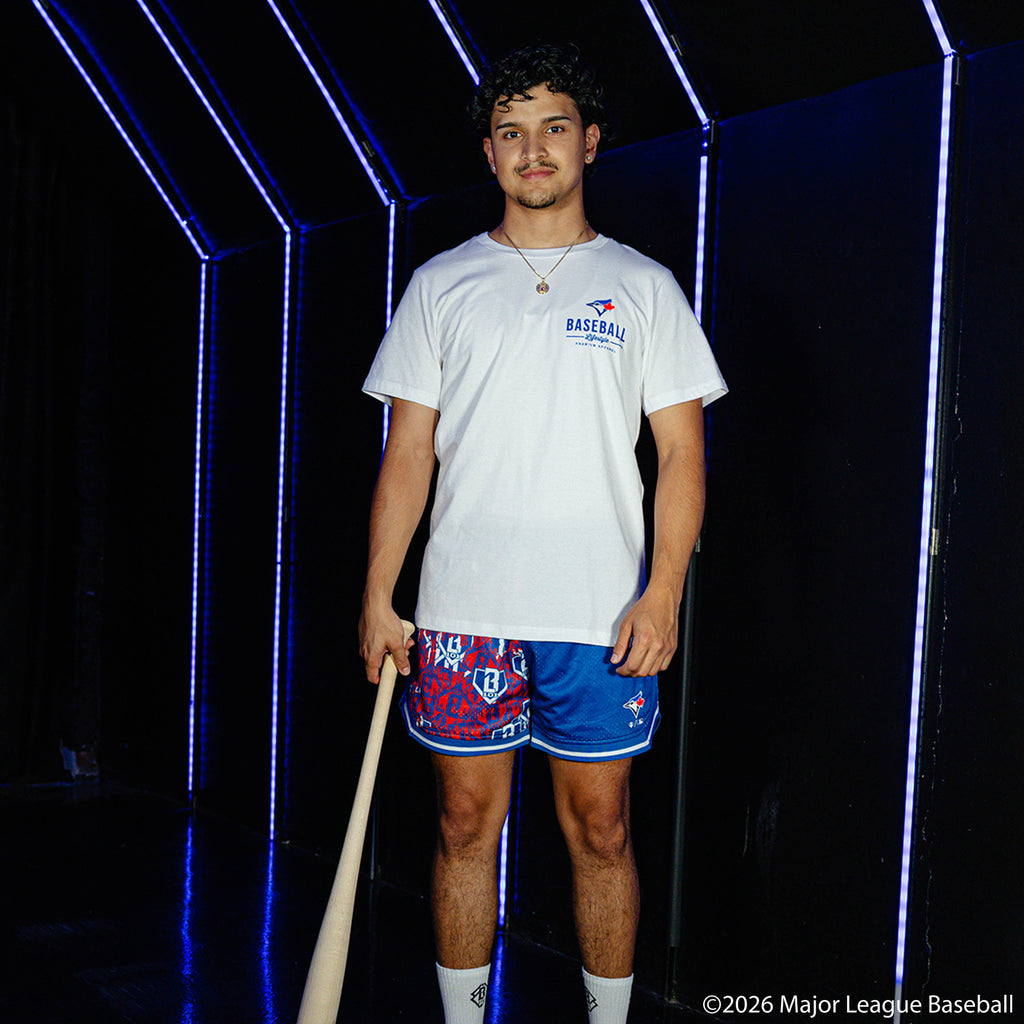 Adult model wearing white graphic tee with "Toronto Blue Jays Ice Cream" design