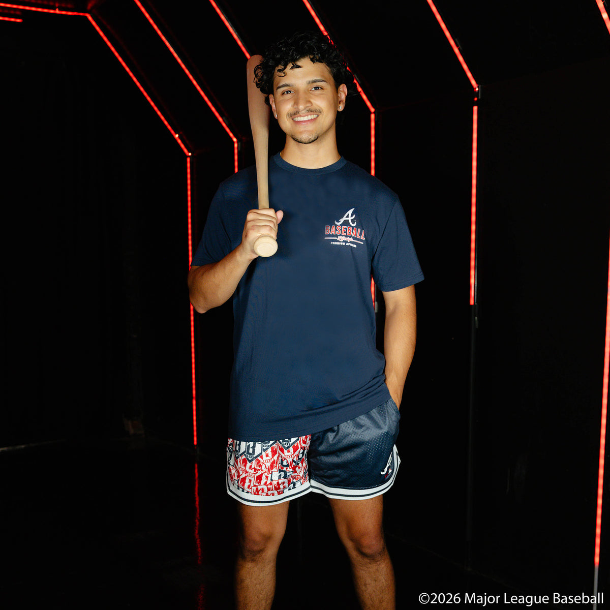 Adult model wearing navy graphic tee with "Atlanta Braves Ice Cream" design