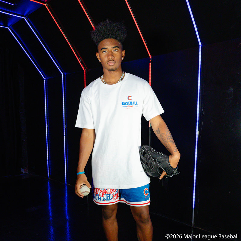 Adult model wearing blue shorts with "Chicago Cubs Sticker Court" design