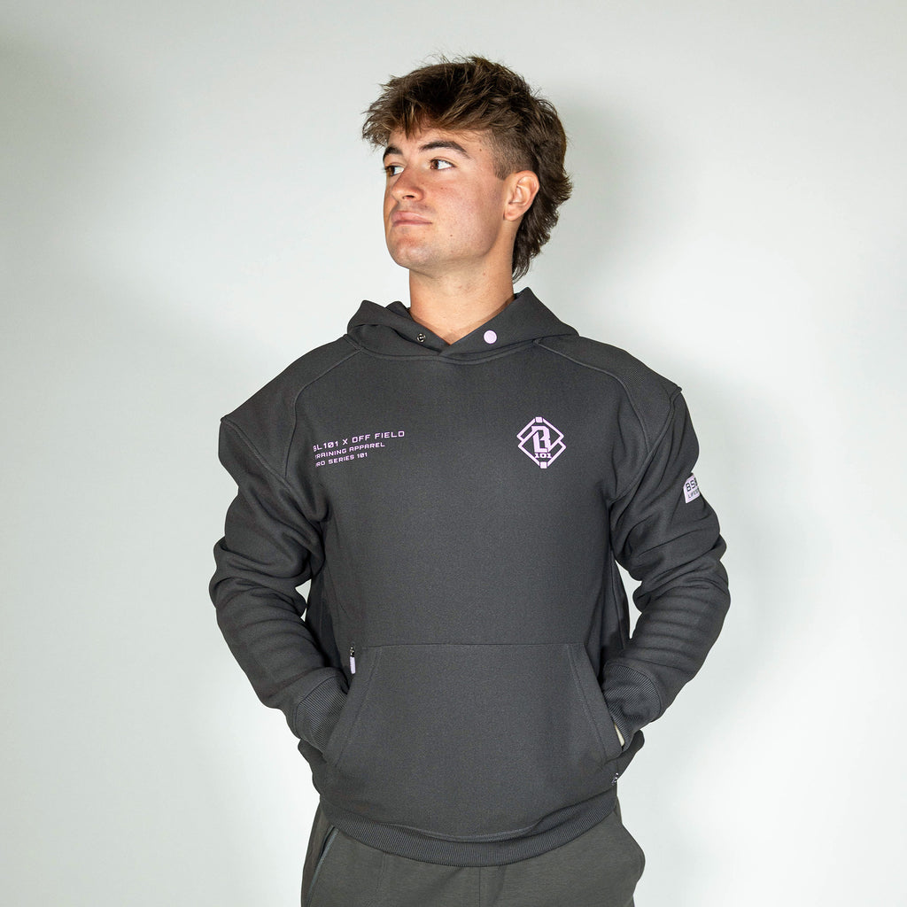 Adult model wearing gray and lilac Off-Field Waffle Performance hoodie