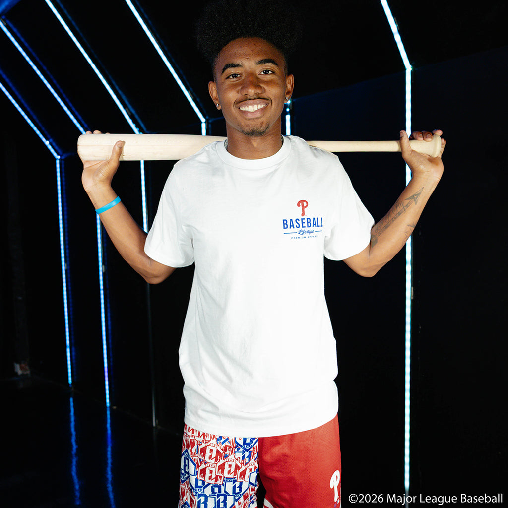 Adult model wearing white graphic tee with "Philadelphia Phillies Ice Cream Cap" design
