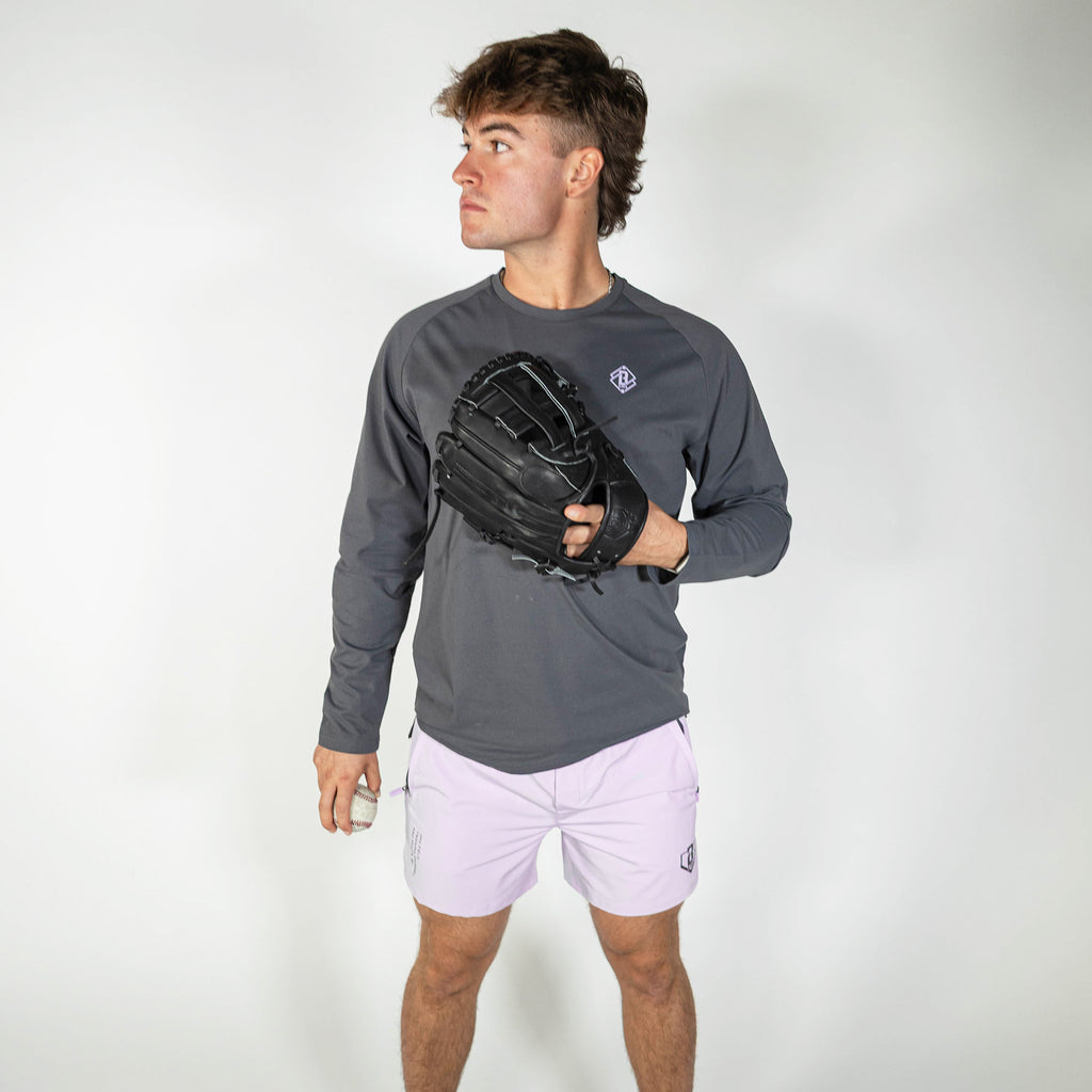 Adult model wearing purple Pro Series V2 shorts with liner