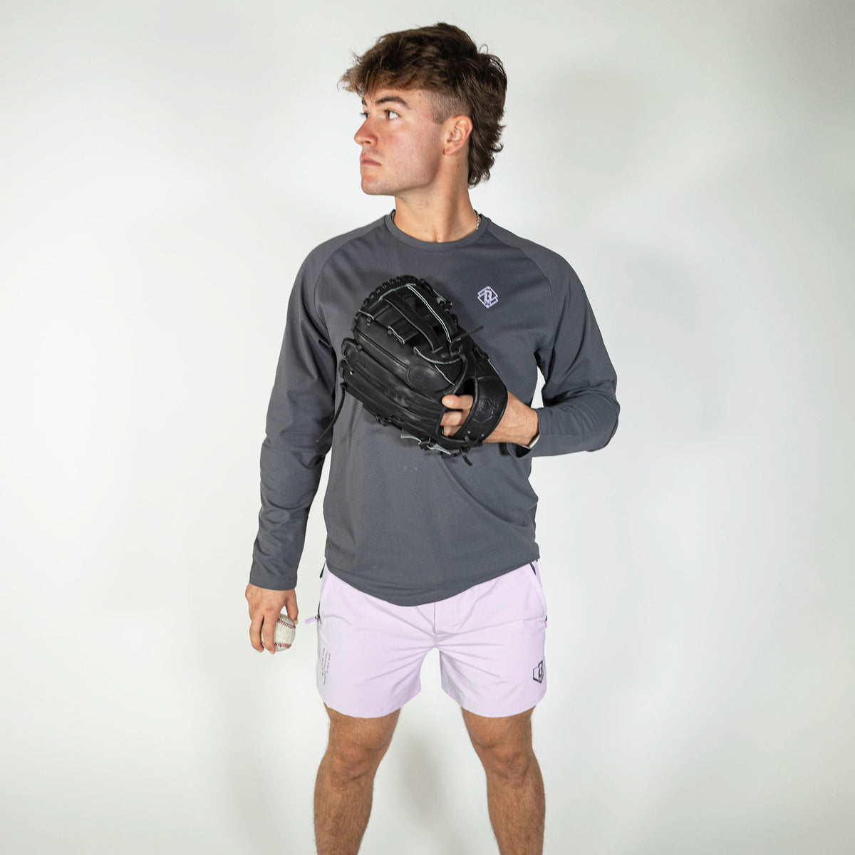 Adult model wearing purple Pro Series V2 shorts with liner
