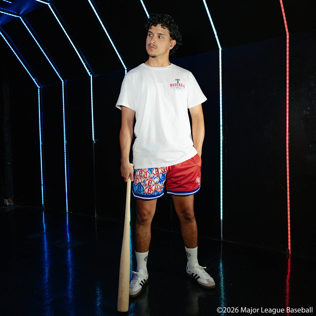 Adult model wearing red shorts with "Texas Rangers Sticker Court" design