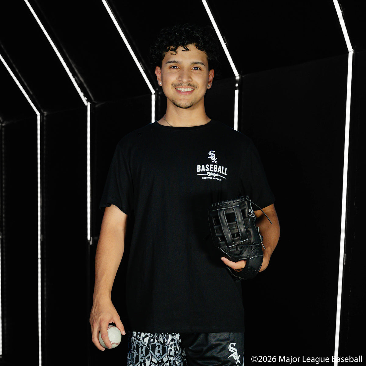 Adult model wearing black graphic tee with "Chicago White Sox Ice Cream" design