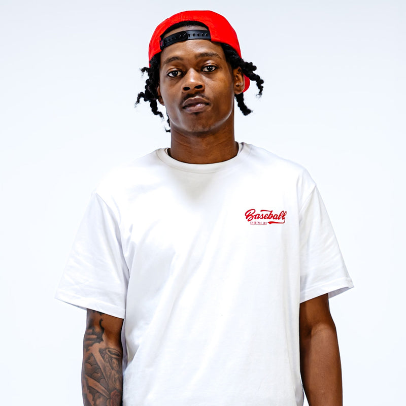 White t-shirt with red 'Baseball Lifestyle 101' text in the top corner on person