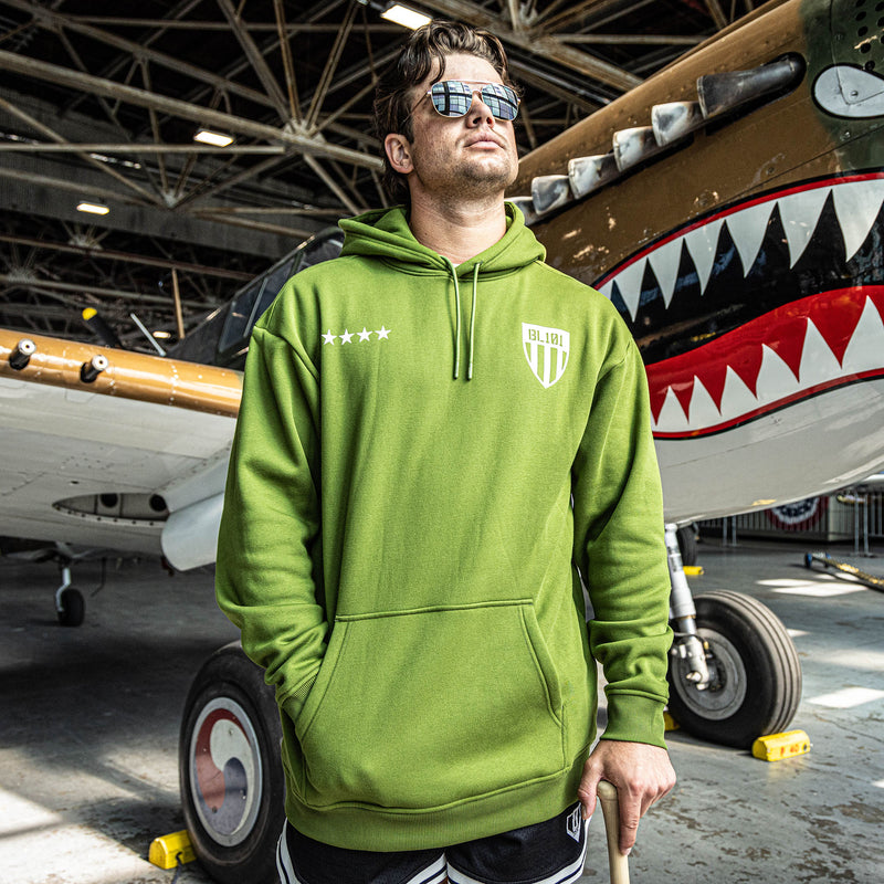 Man wearing Army green Hoodie with white BL101 armor design and five white stars in front of hoodie 