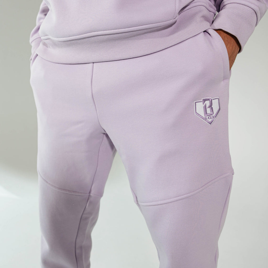 Adult model wearing Purple Baseline joggers