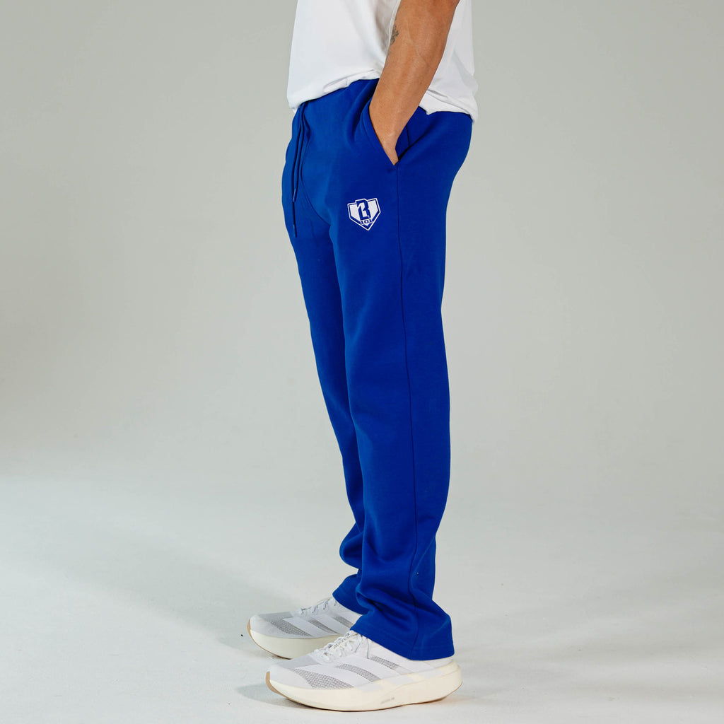 Adult model wearing Blue Baseline Straight Leg sweatpants