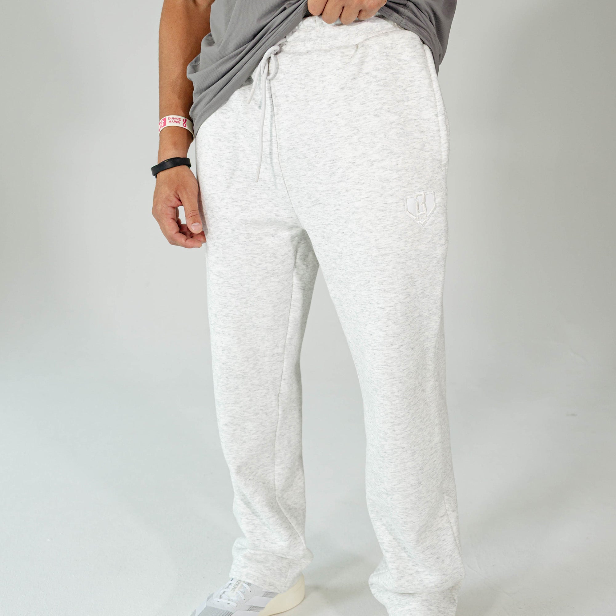 Adult model wearing Gray Baseline Straight Leg sweatpants