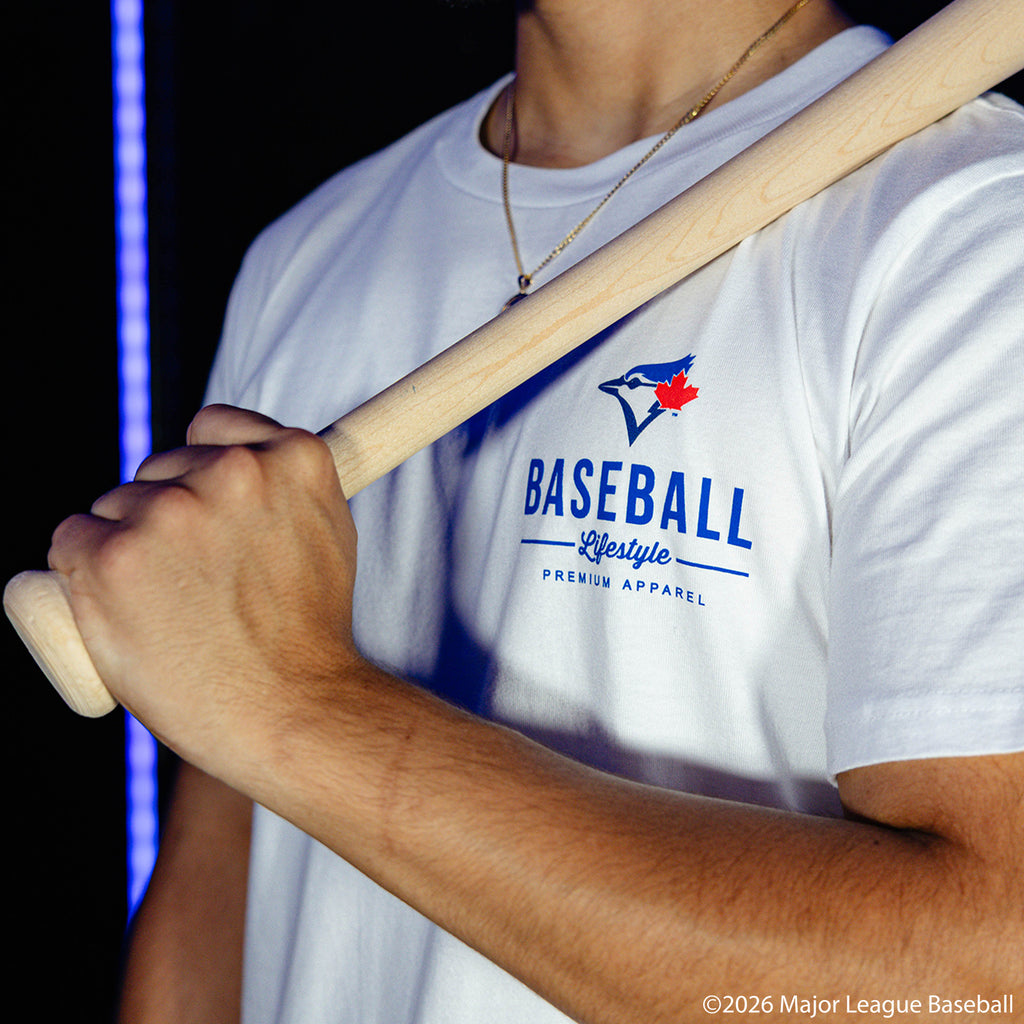 Adult model wearing white graphic tee with "Toronto Blue Jays Ice Cream" design