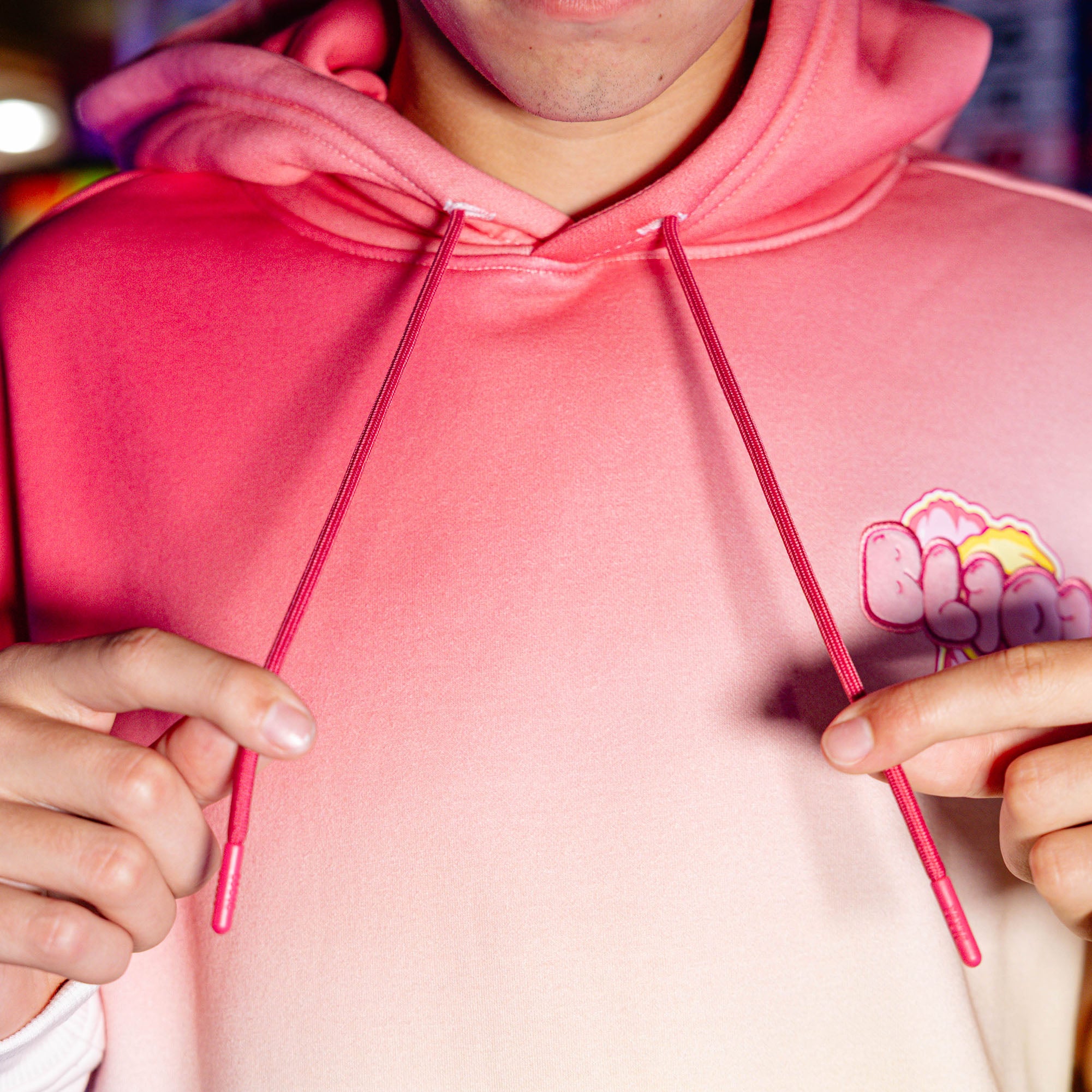 Adult model wearing Cotton Candy Pink Lemonade hoodie