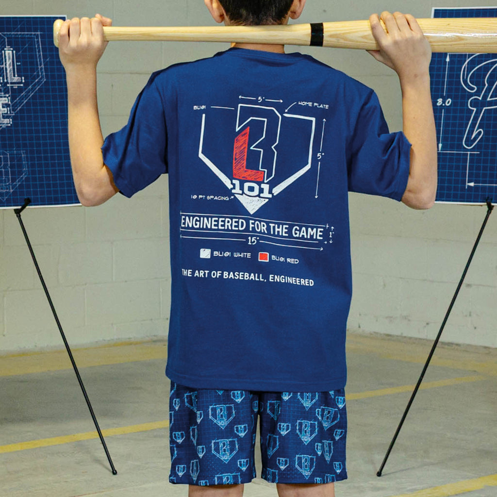 Person wearing a blue t - shirt and Blue shorts with white BL101 graphic pattern 