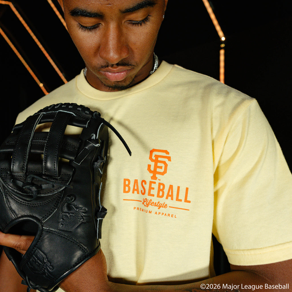 Adult model wearing cream graphic tee with "San Francisco Giants Ice Cream" design