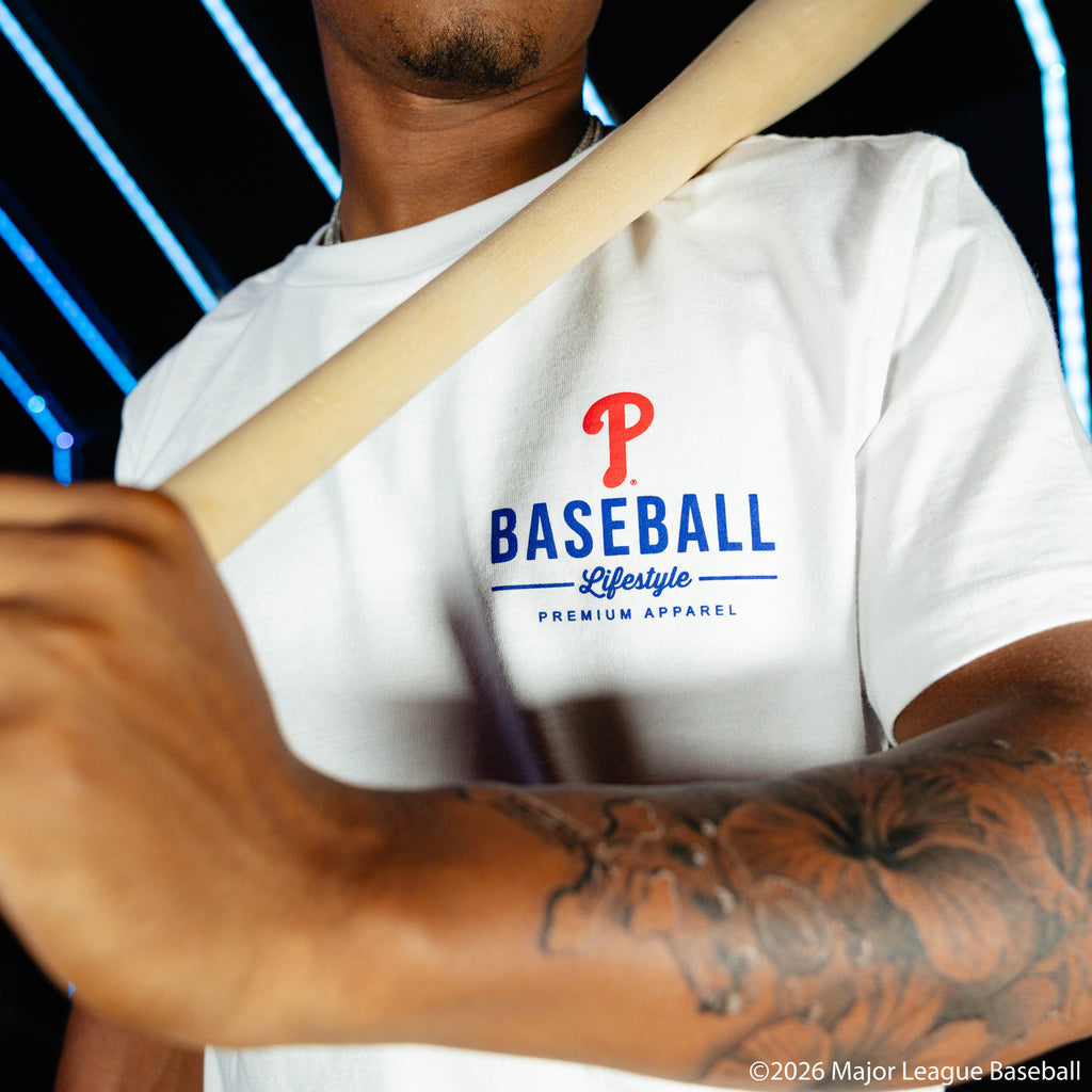 Adult model wearing white graphic tee with "Philadelphia Phillies Ice Cream Cap" design
