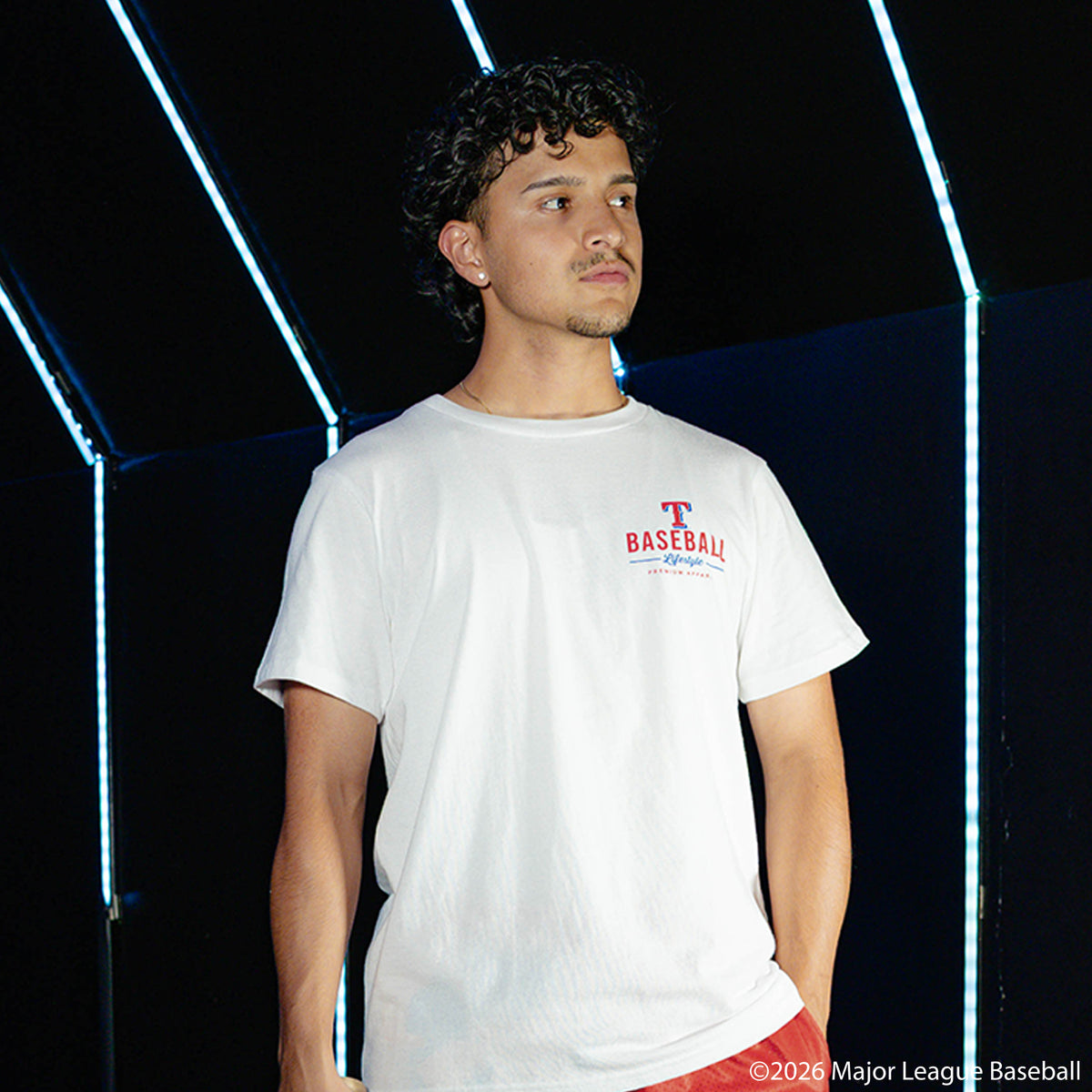 Adult model wearing white graphic tee with "Texas Rangers Ice Cream Cap" design