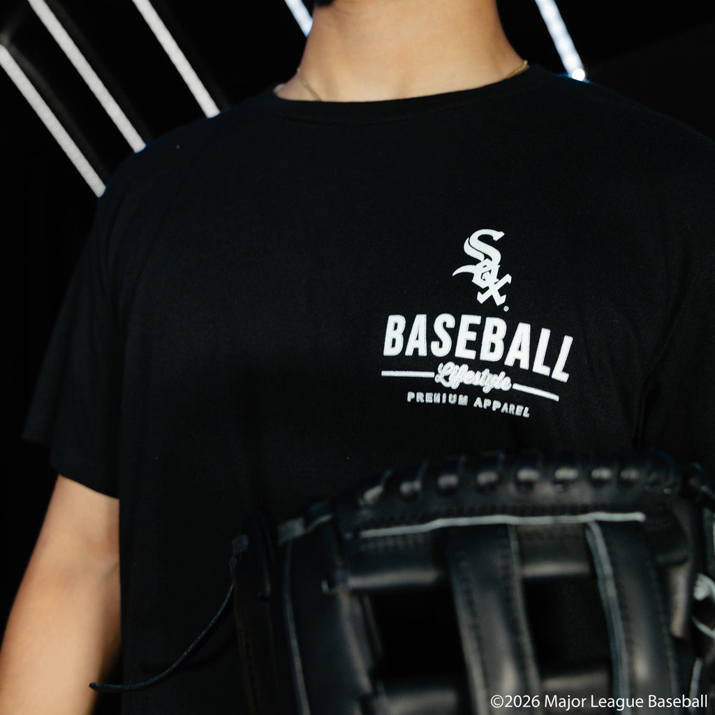 Adult model wearing black graphic tee with "Chicago White Sox Ice Cream" design