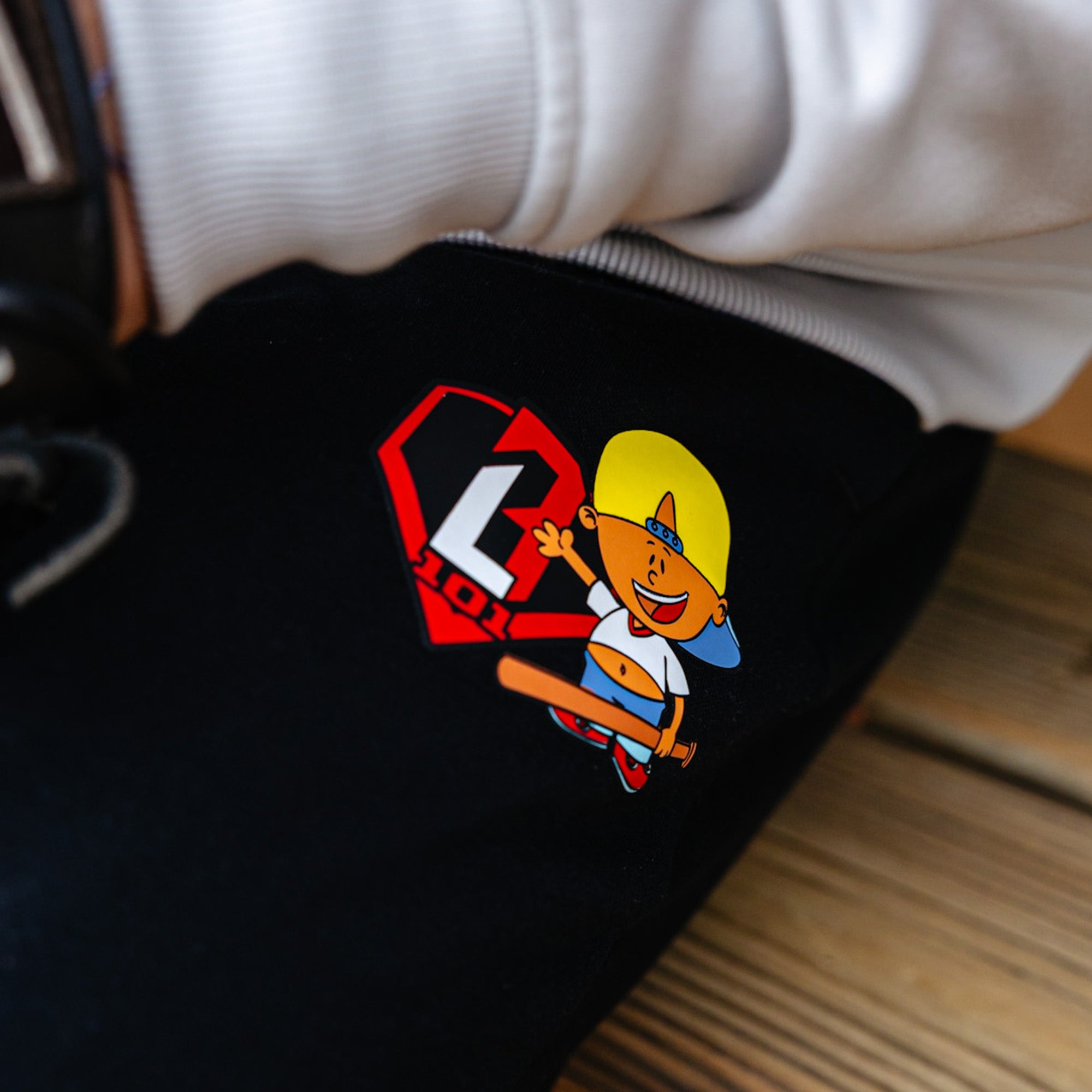Black sweatshirt with a colorful logo featuring a Pablo Sanchez and BL101 logo 