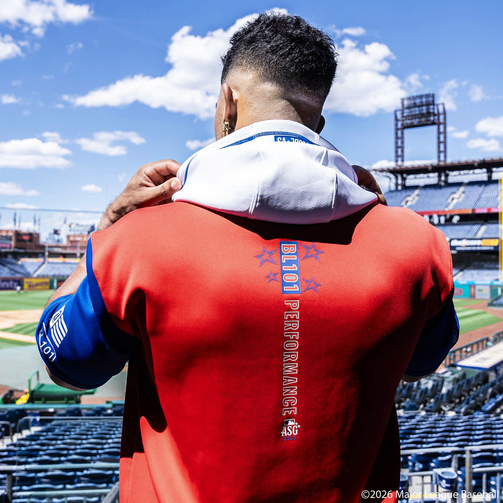Adult model wearing Red, White & Blue short sleeve hoodie with "BL101 All-Star BSBL-SZN V3" design