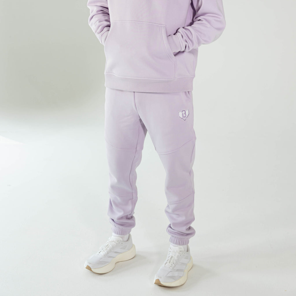 Adult model wearing Purple Baseline joggers