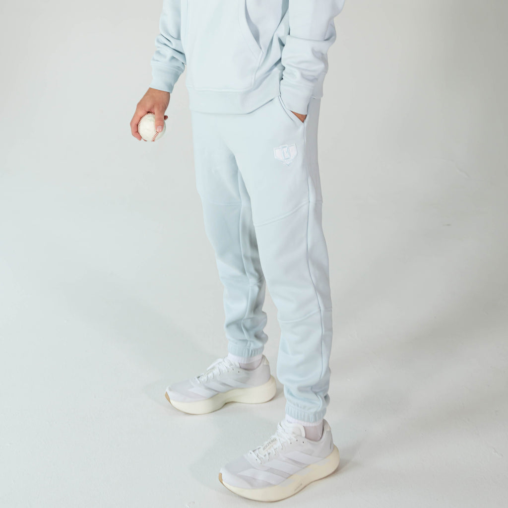 Adult model wearing Blue Baseline joggers