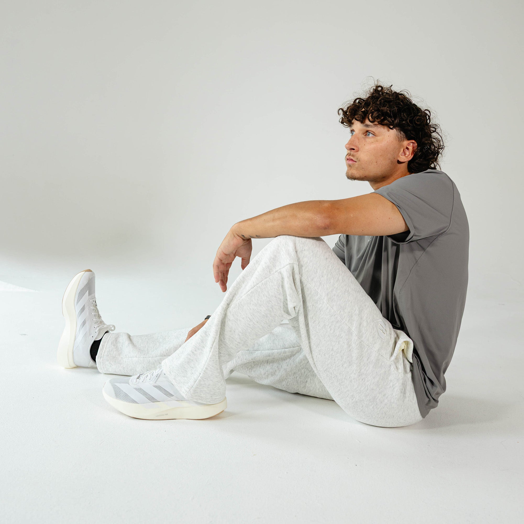 Adult model wearing Gray Baseline Straight Leg sweatpants