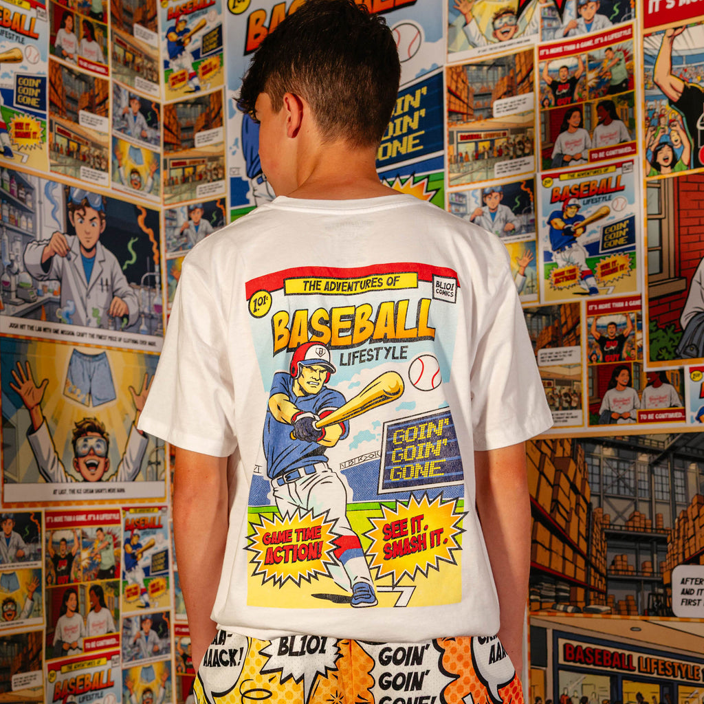 Adult model wearing white graphic tee with "Home Run Hero" design
