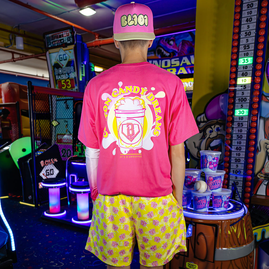 Adult model wearing Home Run Sugar Pink Lemonade shorts