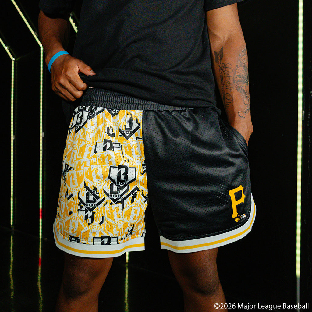 Adult model wearing black shorts with "Pittsburgh Pirates Sticker Court" design