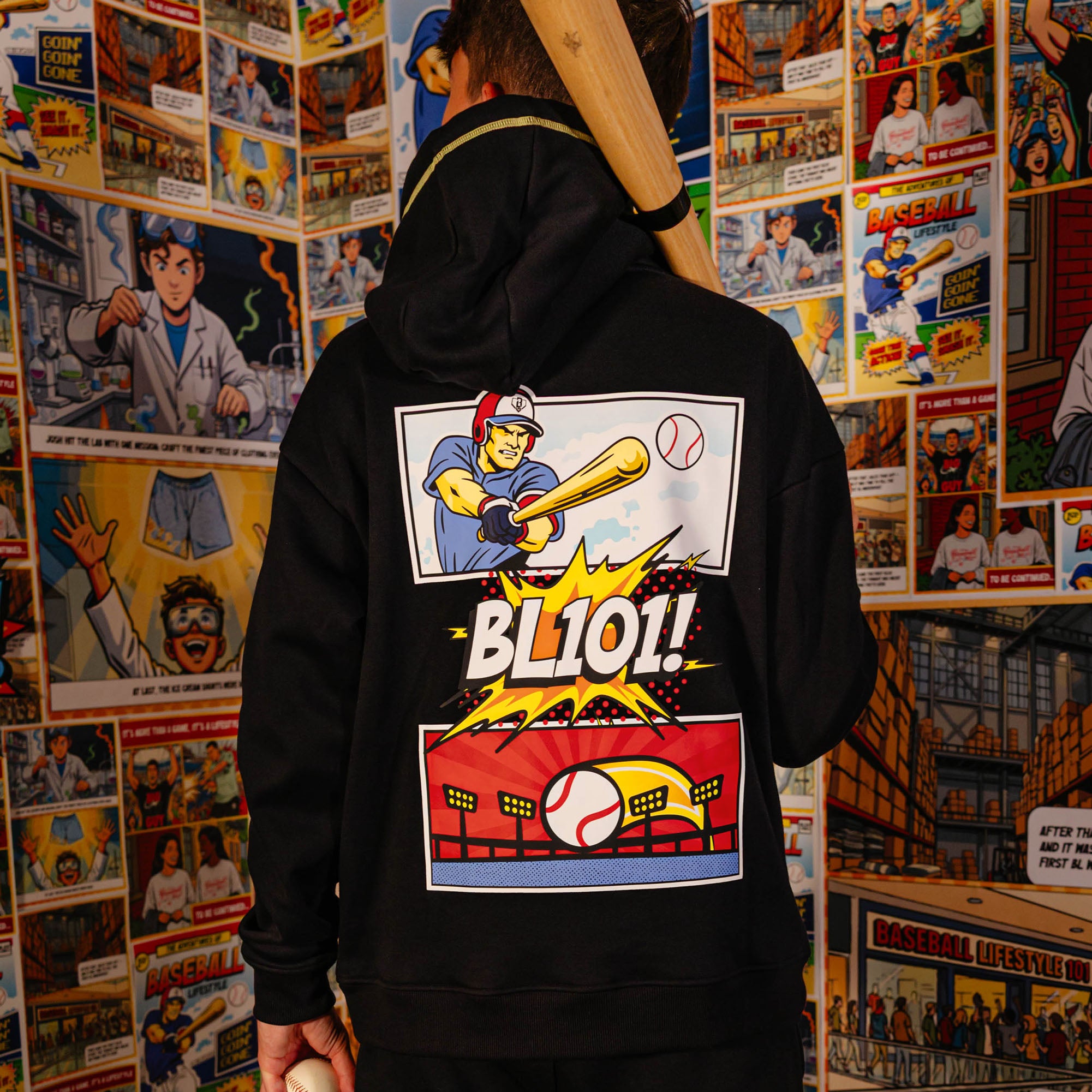 Adult model wearing black hoodie with "Power Hitter" design