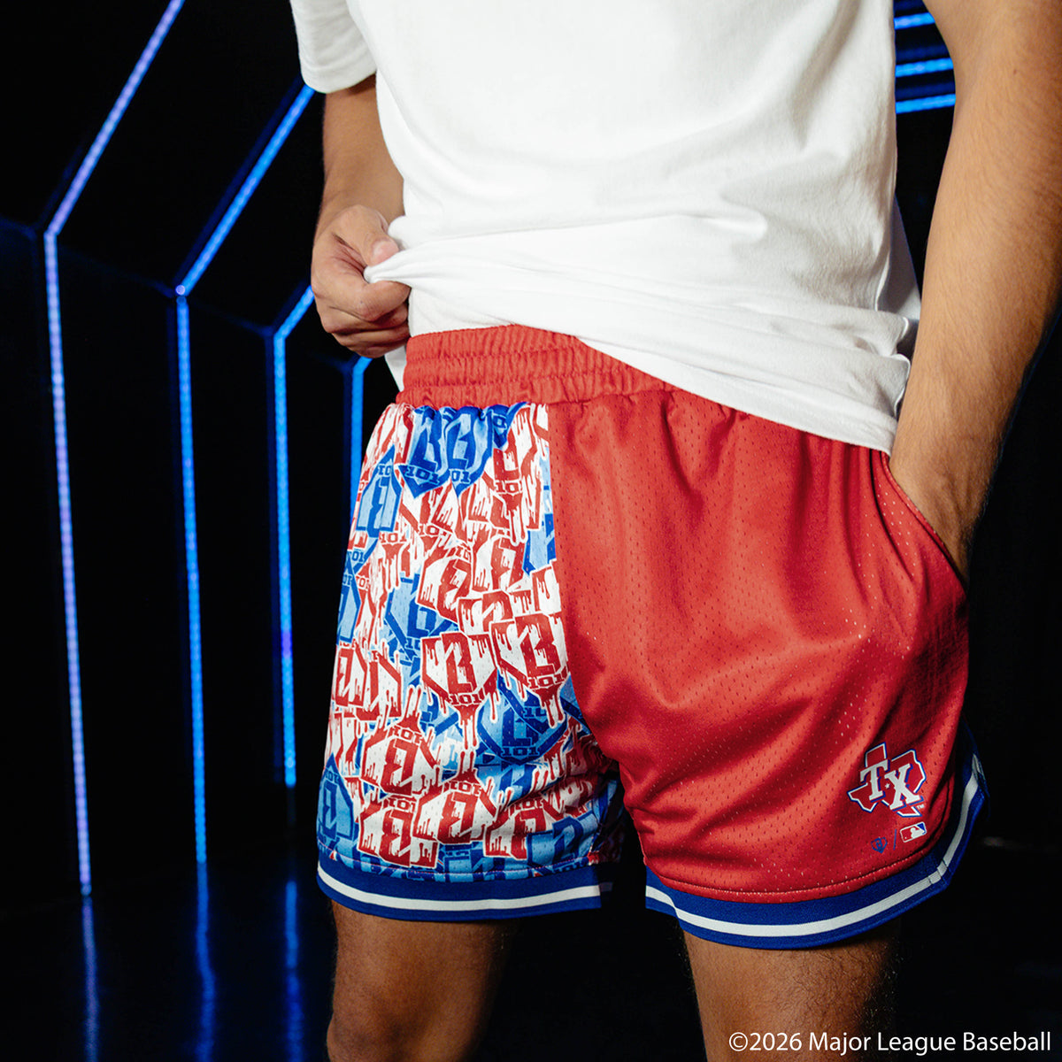 Adult model wearing red shorts with "Texas Rangers Sticker Court" design