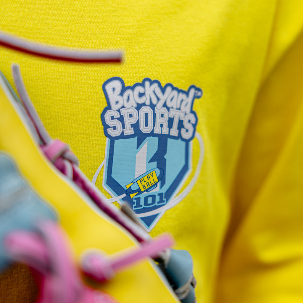 Yellow shirt with 'Backyard Sports' logo 