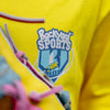 Yellow shirt with 'Backyard Sports' logo 